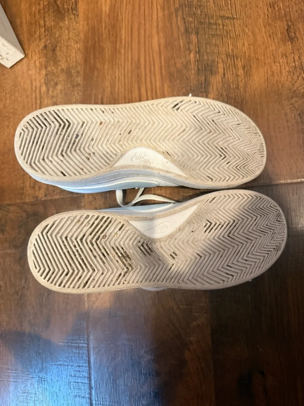 Nike White High-Top Sneakers with Light Blue Swoosh